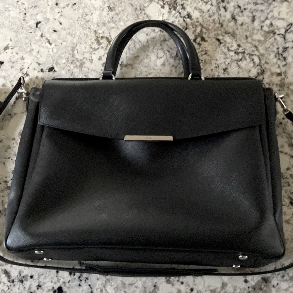 Tumi briefcase. Black with blue lining.